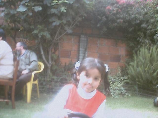 Manejando triciclo, Julio 6 de 2003